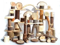 a group of wood pieces stacked on top of each other with different shapes and sizes