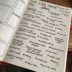 an open notebook with the date night list written in cursive writing on it