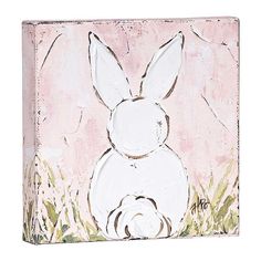 a painting of a white rabbit sitting in the grass