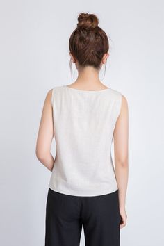 "It's called EveryWear because you can wear this linen tank top... well, everywhere. And we mean everywhere. At the office, happy hour, first dates, second dates, picnics, parties, BBQs, running errands, running 5Ks. You get the idea. DETAILS * 50% linen , 50% cotton blend * Scoop neckline * No zipper * Loose fit * Summer Tank top * Wash by hand or machine with cold water, Ironing after dry * Size Guide https://www.etsy.com/listing/722950722 * SIZE CHART https://www.etsy.com/listing/736810337 * Beige Sleeveless Linen Top, Beige Ramie Summer Top, Beige Ramie Top For Summer, Summer Beige Ramie Tops, Beige Linen Tank Top For Summer, Beige Linen Sleeveless Blouse, Sleeveless Flax Summer Tops, Long Linen Pants, Long Wool Skirt