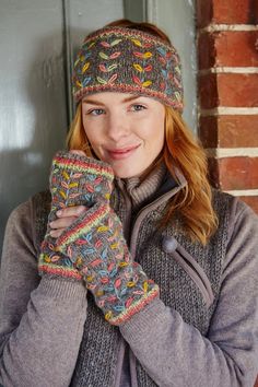 Our Laurel headbands are beautifully embroidered with simple leaf patterns inspired by nature. Perfect for keeping warm this season and beyond! This cozy and fashionable hand knitted headband ear warmer is made in Nepal, supporting fair trade practices. 100%WoolFleece linedFair Trade and Handmade in Nepal Machine wool wash max 30 degrees or cool handwash. Short spin. Dry flat. Do not tumble dry. Embroidered Headbands, Hand Knit Headband, Wool Headband, Embroidered Leaf, Gray Headband, Leaf Patterns, Simple Leaf, Embroidered Leaves, Handmade Fair