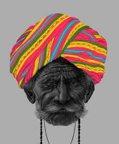 an old man with a colorful turban on his head and beads around his neck