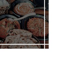 several different types of food sitting on top of a table