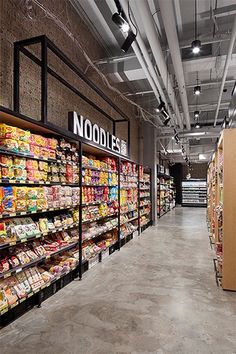 an aisle in a grocery store filled with lots of food and snacks on shelves next to each other