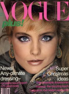 a magazine cover with a woman's face and blue eyes on the front page