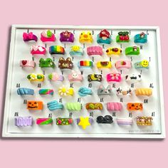 there are many different types of hair clips on this board, and they look like it is made out of plastic