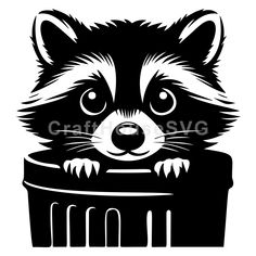 a raccoon sitting in a trash can