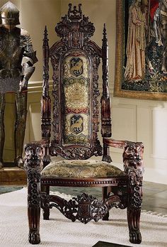 an ornately decorated chair sits in front of paintings