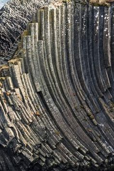 an aerial view of the rock formations at low tide