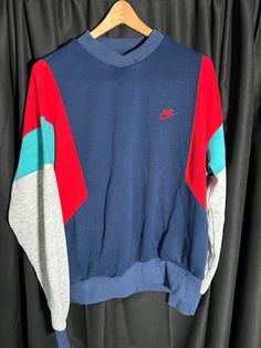 Vintage Nike crewneck.  Adult XL, runs a little small and fits more like an adult Large.  In great condition. Mens Vintage Nike Jumpers, Nike Retro Sweater, Nike 90s Vintage Sweater, Vintage Orange Nike Sweater, Nike Crewneck, 90s Sweatshirt, Vintage Nike, True Vintage, Gender Neutral