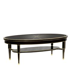 a black and gold coffee table with two shelves