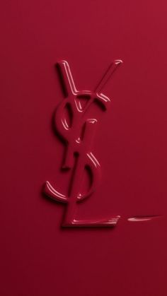 the logo for saint laurent on a red background