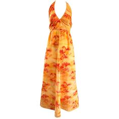 Incredible 1970s Asian themed novelty boho maxi dress! Features a vibrant bright orange, with prints in a brighter orange and red orange throughout. Ties at back top neck with zipper up the skirt. Great with sandals, flats or wedges for day and heels for evening. In great condition. Approximately Size Small - Small Medium Measurements: (slight stretch) 34-36 inch bust 26-27 inch waist Free hips 60 inches from top back halter to hem Orange Clothes Aesthetic, Retro Dress 70s, Sun Fairy, 1970s Costume, Vintage Dresses For Sale, Vintage Halter Dress, Dresses Orange, Hostess Dresses, Vintage Boho Dress