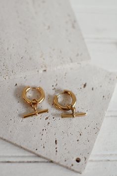 Lightweight drop earrings featuring an interlocking chain and bar. Perfect touch of edge. Lightweight, and great for every day wear. Stainless Steel, 18k gold plated tarnish free, hypoallergenic Cuffing Season, Chain Earrings, 18k Gold, Gold Plate, Every Day, Plating, Stud Earrings, Drop Earrings, Stainless Steel