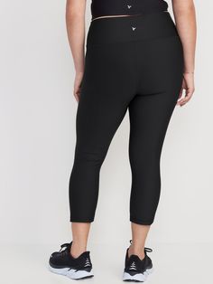 elasticized waist breathable go-dry wicks moisture sits at belly button fitted hits mid-calf 21" inseam models are approx.  5'9" and wear sizes s (4), l (12), and xl (18)machine wash according to the care instruction label Black Gym Bottoms With 5-inch Inseam, Black Compression Bottoms For Athleisure, High Waist Black Bottoms With Moisture-wicking, High Waist Black Moisture-wicking Bottoms, High Waist Moisture-wicking Black Bottoms, Compression Activewear With Elastic Waistband, Hip-length, Casual Go-dry Leggings With 5-inch Inseam, Sportswear Bottoms For Pilates, Mid-thigh Length, Mid-rise Compression Bottoms With Go-dry Technology