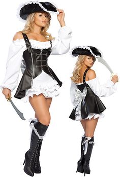 two women dressed in pirate costumes posing for the camera, both wearing black and white outfits