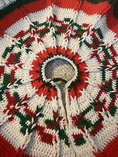 a crocheted dishcloth with a spoon in it