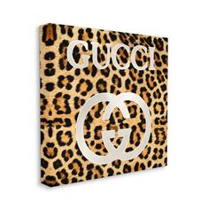 a leopard print canvas with the word gucci on it's front and side