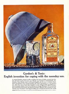 an advertisement for gordon's gin and tonic with a hat on top of it