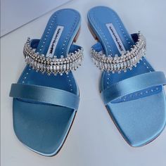 100% Guaranteed Authentic Size: 1/2 36 Condition: Like New , With Original Box And Dust Bags. Descriptions: Highlights Bright Blue Satin Crystal Embellishment Double-Strap Design Open Toe Stacked Sole Composition Outer: Satin 100% Outer Satin, Shoes Manolo Blahnik, Satin Sandals, Blahnik Shoes, Manolo Blahnik Shoes, Strap Design, Crystal Embellishment, Blue Satin, Manolo Blahnik