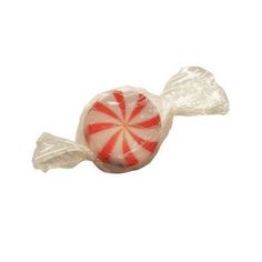 a lollipop is wrapped in clear cellophane and sits on a white surface