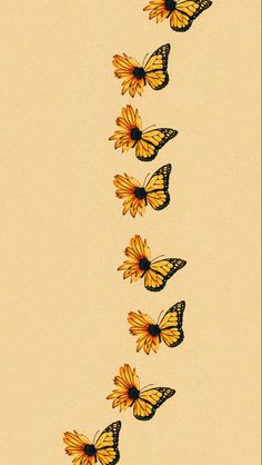 a group of yellow butterflies flying through the air