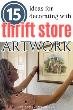 a woman holding up a painting with the words 15 ideas for decoring with thrift store art work