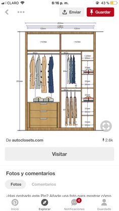 an open closet with clothes hanging on it