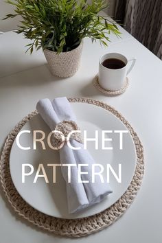 a crochet placemat on a white plate with a cup of coffee in the background