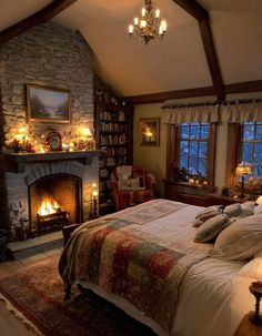 a bedroom with a fireplace and bed in it