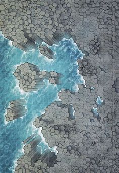 an aerial view of the ocean with rocks and water