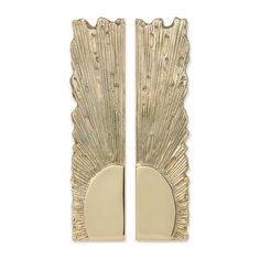 a pair of gold wall sconces on a white background