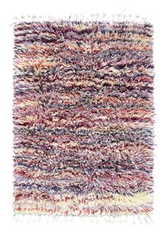 a multicolored rug with fringes on the bottom and one end in different colors