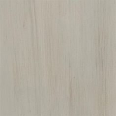 a close up view of a white wood texture