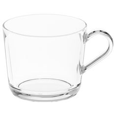 a clear glass cup with a handle on the bottom and inside is sitting in front of a white background