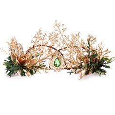 a tiara with flowers and leaves on it