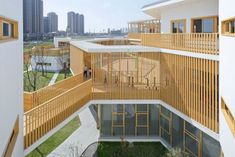 an aerial view of a building with wooden balconies