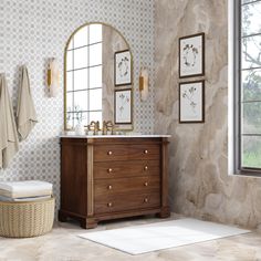 a bathroom with a sink, mirror and towel rack in it's corner next to a window