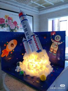 a model rocket is on display in a room