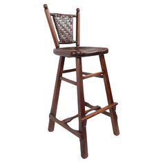 a wooden bar stool with a woven seat and backrest on an isolated white background