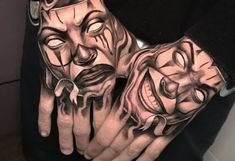 a person with tattoos on their hands and two faces