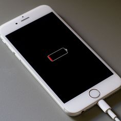 an iphone with a battery attached to it