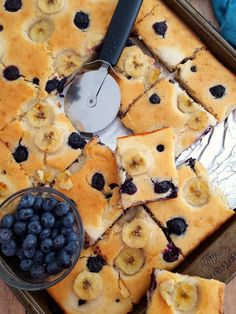 a pan filled with blueberries and banana slices