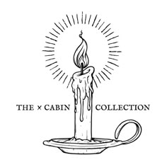 the x cabin collection logo with a lit candle on top of a saucer in black and white