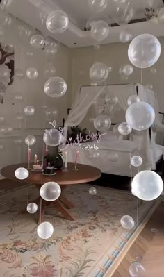 a living room filled with lots of bubbles floating in the air