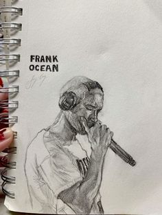 a drawing of a man holding a microphone in front of his face with the words frank ocean written on it