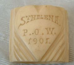 a carved plaque with the name and date of sheleenn p o w 1911