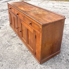 an old wooden chest sitting on the ground