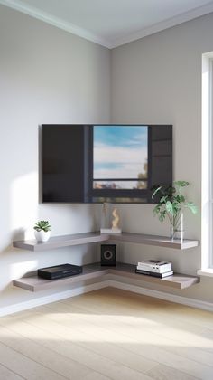 a flat screen tv mounted to the side of a wall