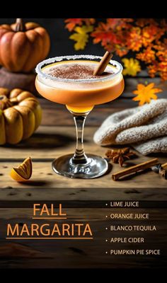 the fall margarita cocktail is served in a coupe glass with cinnamon and an orange garnish